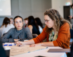 Women participating in conference workshop